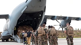 French soldiers prepare to board a military Airbus A400M to evacuate French citizens from Afghanistan, Monday, Aug.16, 2021 in Orleans, central France.