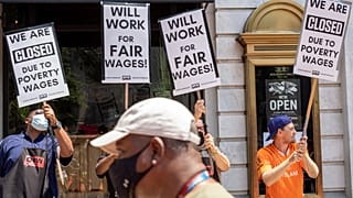 US restaurant workers protested over low pay this year, demanding to be paid the minimum wage plus tips. 