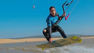 Man kitesurfing