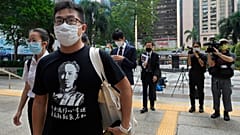 Pro-democracy activist Raphael Wong arrives at a local court in Hong Kong Thursday, Aug. 19, 2021. 