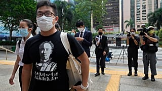 Pro-democracy activist Raphael Wong arrives at a local court in Hong Kong Thursday, Aug. 19, 2021.