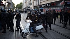 French riot police secure a street during a march against police brutality and racism in Marseille, France, June 13, 2020