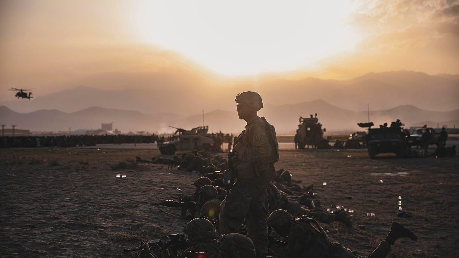 U.S. Army Soldiers assigned to the 10th Mountain Division stand security at Hamid Karzai International Airport, in Kabul, Afghanistan, Monday, Aug. 16, 2021
