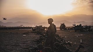 U.S. Army Soldiers assigned to the 10th Mountain Division stand security at Hamid Karzai International Airport, in Kabul, Afghanistan, Monday, Aug. 16, 2021