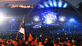 FILE: Estonians gather at Tallinn Song Festival Grounds in Tallinn, Estonia, Saturday, Aug. 20, 2011, to celebrate the 20th anniversary of country's restored independence