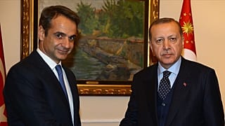 Yunanistan Başbakanı Kirgios Miçotakis (solda) ve Recep Tayyip Erdoğan (sağda)