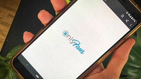 This photo shows a phone app for OnlyFans, a site where fans pay creators for their photos and videos. 19 August 2021.