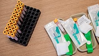Equipment used to take blood samples sits on a table at a antibody testing program at the Hollymore Ambulance Hub, in Birmingham, England.