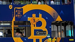 إعلان عن عملة البيتكوين، إحدى العملات المشفرة في هونغ كونغ  الأربعاء 12 مايو 2021