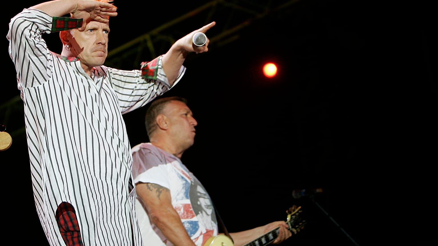  John Lydon, left, and Steve Jones of British punk band the Sex Pistols perform during the Exit music festival in Novi Sad, Serbia in July 2008