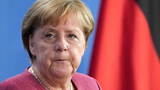 German Chancellor Angela Merkel briefs the media during a news conference after a virtual G7 summit on Afghanistan at the chancellery in Berlin, Germany, Aug. 24, 202