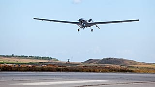 A  Bayraktar TB2 drone is pictured flying at Gecitkale military airbase in northern Cyprus.