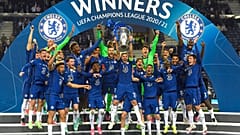 Chelsea's team captain Cesar Azpilicueta lifts the trophy at the end of the Champions League final soccer match between Manchester City and Chelsea in Porto
