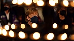 German Chancellor Angela Merkel sits during an ecumenical service and memorial ceremony for the victims of the flood disaster in western Germany at Aachen Cathedral, in Aachen
