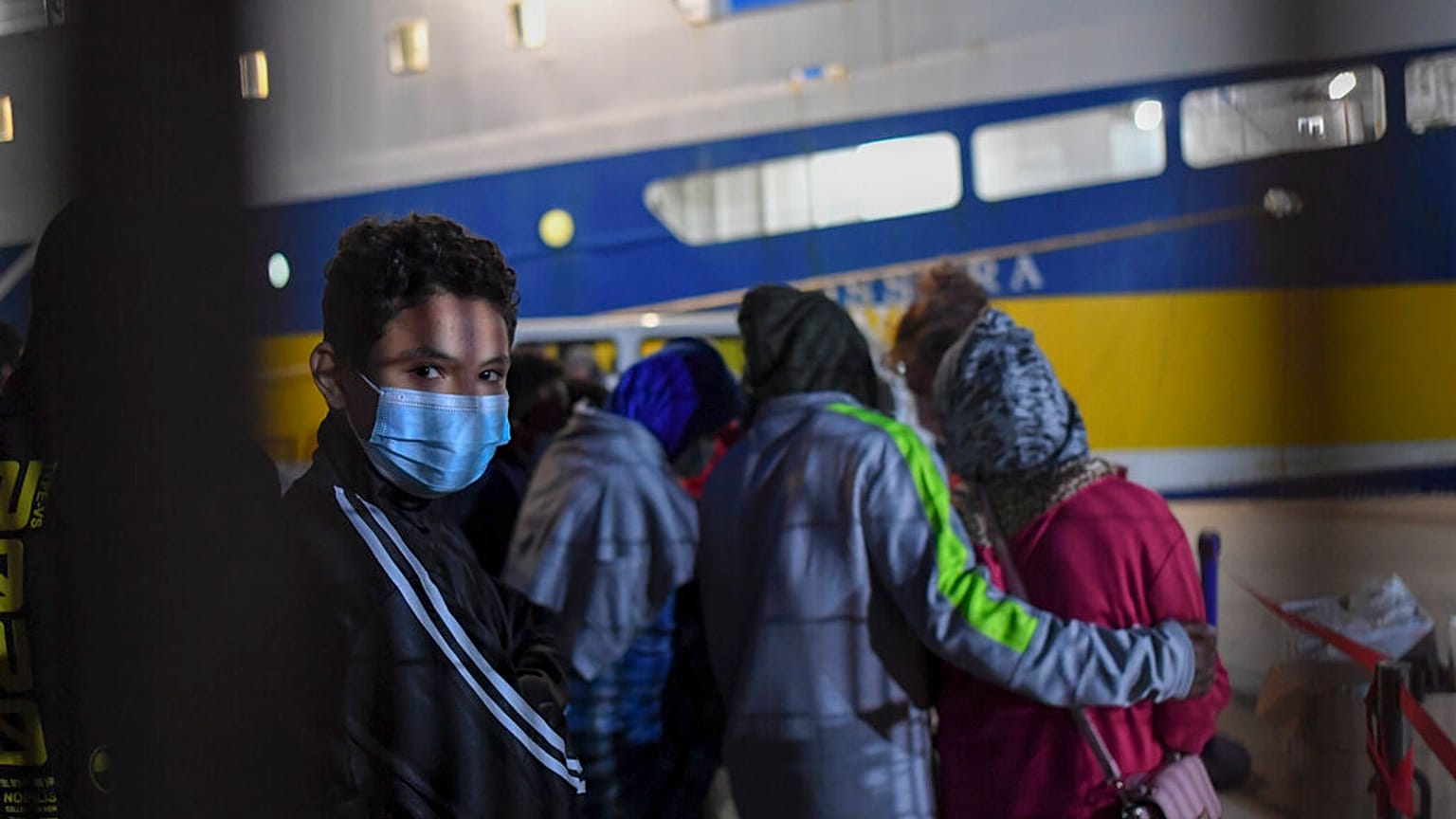 Some 80 unaccompanied minors from the island of Lampedusa's migrant housing center, Sicily, are embarked on the ship Cossyra, Wednesday, May 12, 2021
