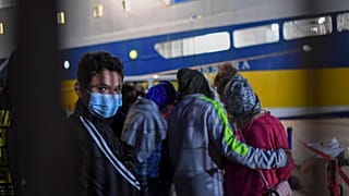 Some 80 unaccompanied minors from the island of Lampedusa's migrant housing center, Sicily, are embarked on the ship Cossyra, Wednesday, May 12, 2021