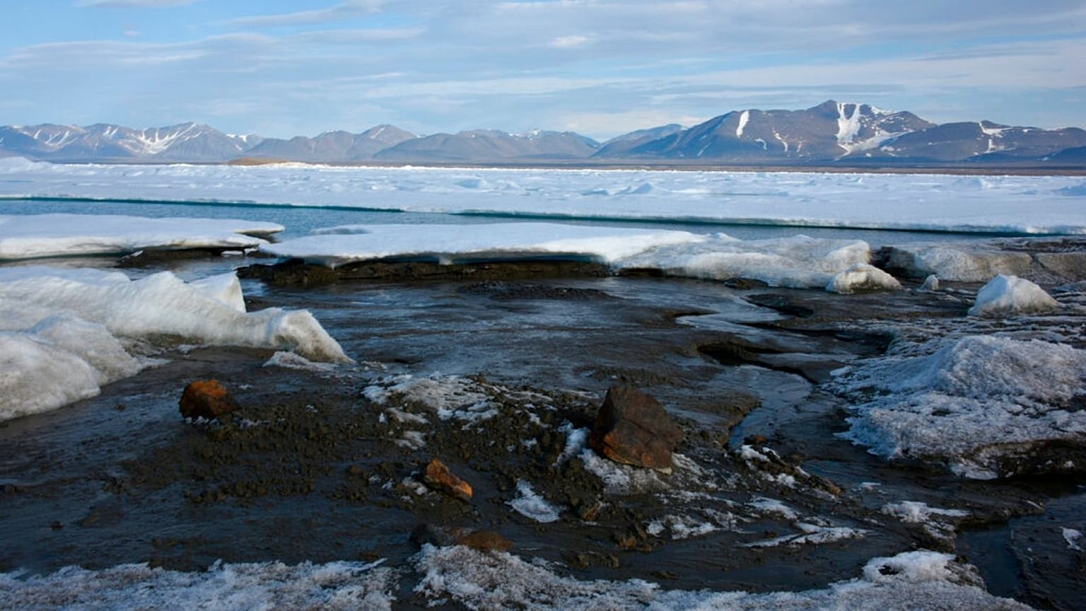 In this photo provided by Morten Rasch on Saturday, Aug. 28, 2021, a view of the newly discovered Island, off the coast of Greenland.