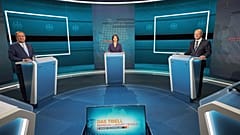 Candidates for chancellor from left, Armin Laschet, Annalena Baerbock and Olaf Scholz stand before the broadcast in the TV studio in Berlin, Sunday, Aug. 29, 2021. 