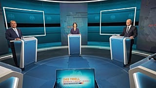 Candidates for chancellor from left, Armin Laschet, Annalena Baerbock and Olaf Scholz stand before the broadcast in the TV studio in Berlin, Sunday, Aug. 29, 2021. 