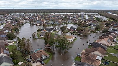 Flooded streets and homes are shown in the Spring Meadow subdivision in LaPlace, La., after Hurricane Ida moved through, Aug. 30, 2021. 