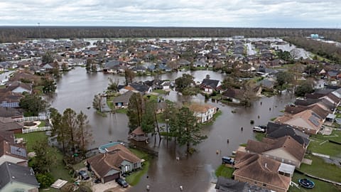 Flooded streets and homes are shown in the Spring Meadow subdivision in LaPlace, La., after Hurricane Ida moved through, Aug. 30, 2021.
