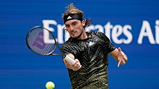 Stefanos Tsitsipas, of Greece, returns a shot to Andy Murray