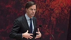 Caretaker Dutch Prime Minister Mark Rutte apologizes to other party leaders during a debate in parliament in The Hague, Netherlands, April 2, 2021.