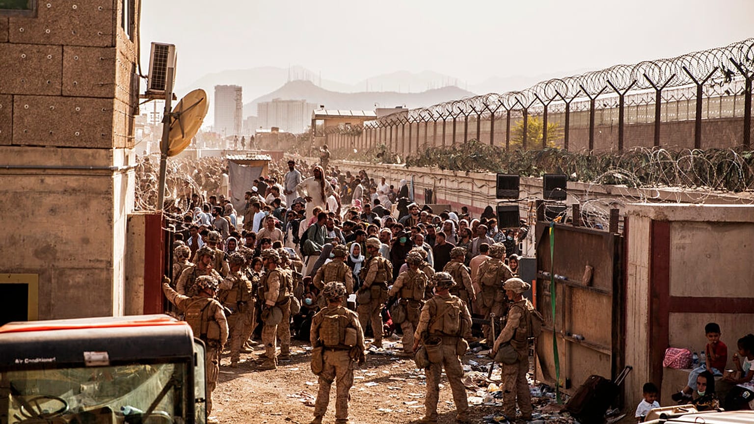 US troops provide assistance during an evacuation at Hamid Karzai International Airport in Kabul