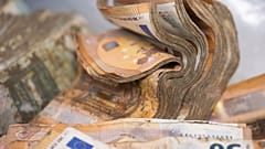 Soaked and mouldy euro banknotes are waiting to be dried at the Bundesbank in Mainz.