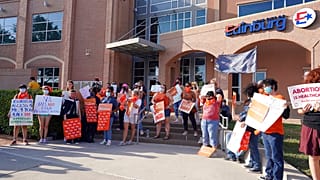 Abortion rights supporters gather to protest in front of Edinburg City Hall on Wednesday, Sept. 1, 2021, in Edinburg, Texas.