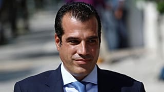 Thanos Plevris arrives at the Presidential Palace in Athens on Tuesday.