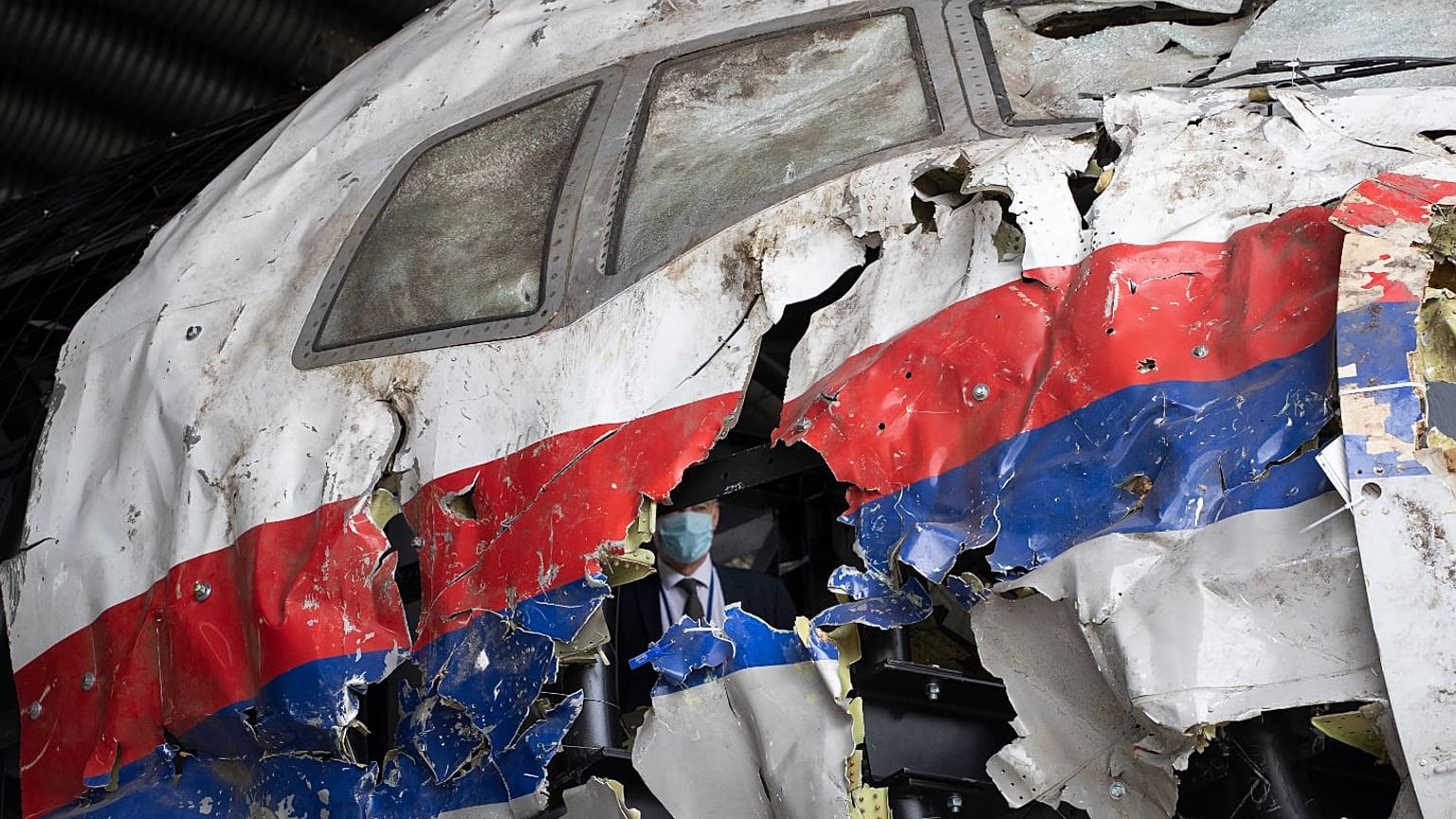 The reconstructed wreckage of Malaysia Airlines Flight MH17 at the Gilze-Rijen military airbase in the Netherlands.