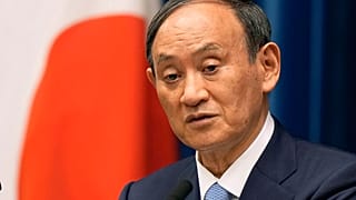 FILE - In this Aug. 17, 2021, file photo, Japanese Prime Minister Yoshihide Suga speaks during a news conference at prime minister's official residence in Tokyo. 