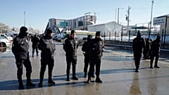 FILE PHOTO: Police officers attend as members of rescue services work at the scene of a train accident, rear, in Ankara, Turkey, Thursday, Dec. 13, 2018.