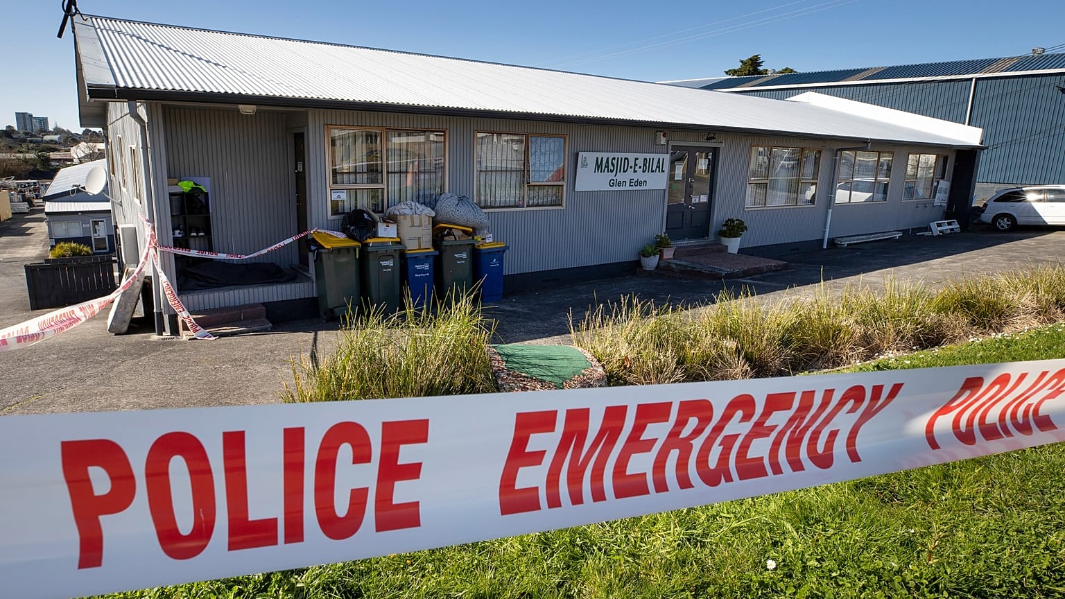 Police security tape outside a mosque in Auckland, New Zealand, Saturday, Sept. 4, 2021.