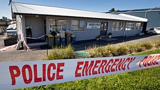 Police security tape outside a mosque in Auckland, New Zealand, Saturday, Sept. 4, 2021.