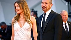 Antonio Banderas, right, and Nicole Kimpel pose for photograph upon arrival at the premiere of the film 'Official Competition' during the 78th Venice Film Festival.