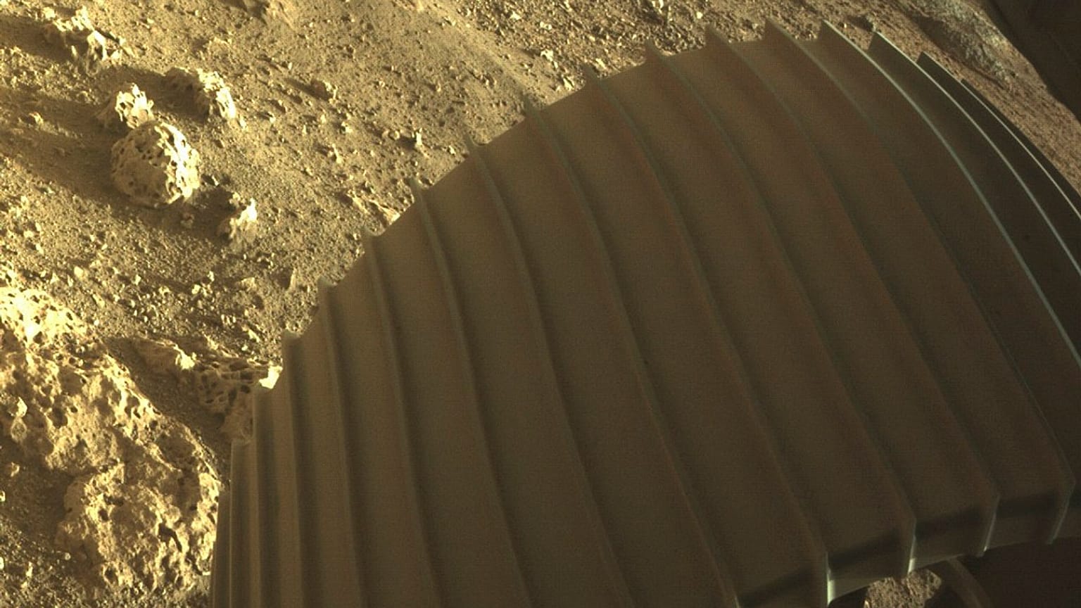 One of the six wheels on the Perseverance Mars rover, which landed on Thursday, Feb. 18, 2021. 