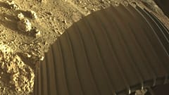 One of the six wheels on the Perseverance Mars rover, which landed on Thursday, Feb. 18, 2021. 