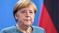 German Chancellor Angela Merkel attends a news conference with Austria's Chancellor Sebastian Kurz prior to a meeting at the chancellery in Berlin, Germany, Tuesday, Aug. 31.
