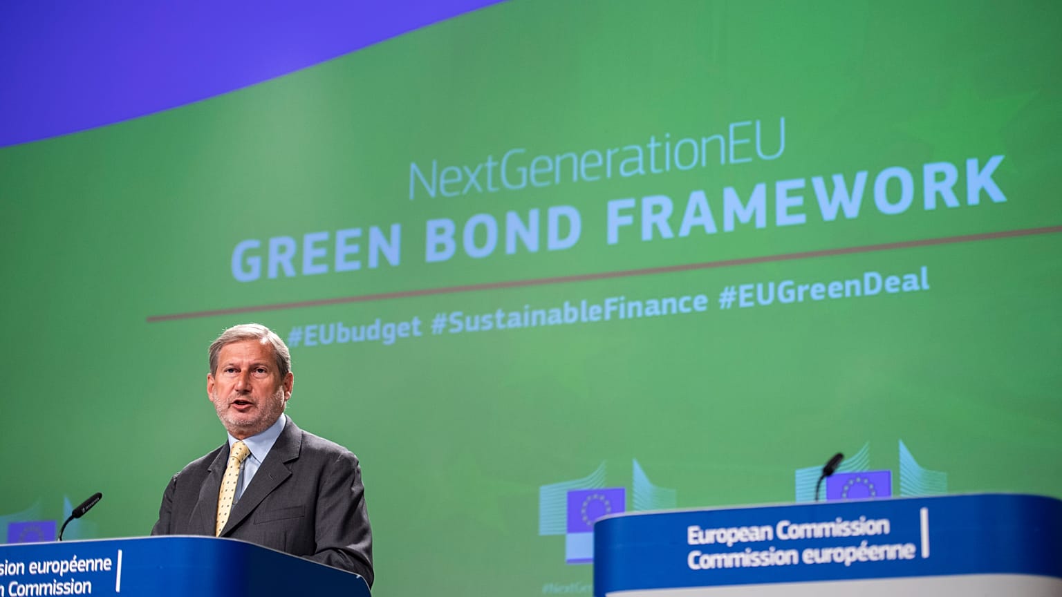 EU Commissioner Johannes Hahn said EU green bonds could total €250 billion by 2026.