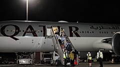 Evacuees from Afghanistan arrive at Hamad International Airport in Qatar's capital Doha on the first flight carrying foreigners out of Kabul since the US withdrawal. 9/9/21.