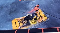 A rescue swimmer during a rescue operation of migrants by patrol boats of the Lampedusa Coast Guard.
