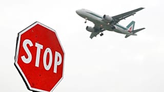  In this Monday, March 20, 2017 file photo, an Alitalia plane comes in for landing at Linate Airport, in Milan, Italy.