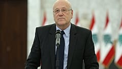 رئيس الوزراء اللبناني المكلف، نجيب ميقاتي، في مؤتمر صحفي عقب لقائه بالرئيس ميشال عون في القصر الرئاسي في بعبدا، في 16 أغسطس/آب 2021