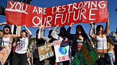 Environmental activists rally during the UK Student Climate Network's Global Climate Strike protest action in central London, on September 20, 2019.