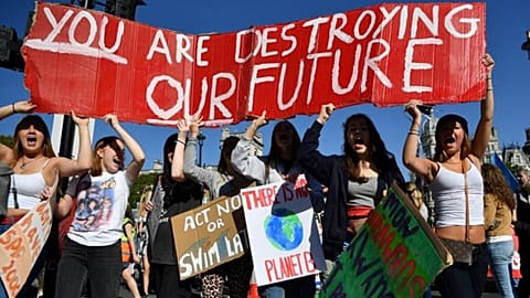 Environmental activists rally during the UK Student Climate Network's Global Climate Strike protest action in central London, on September 20, 2019.