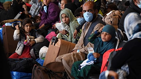 Afghan refugees are processed inside Hangar 5 at the Ramstein U.S. Air Base in Germany Wednesday, Sept. 8, 2021. U.S.