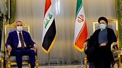 رئيس الوزراء العراقي مصطفى الكاظمي بصحبه رئيسي في طهران