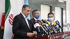 Head of the AEOI Mohammad Eslami delivering a speech next to Director General of the IAEA Rafael Grossi